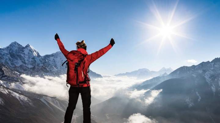 A man on top of a mountain 