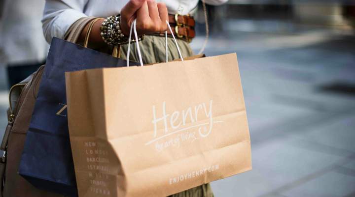 A woman carrying shopping bags