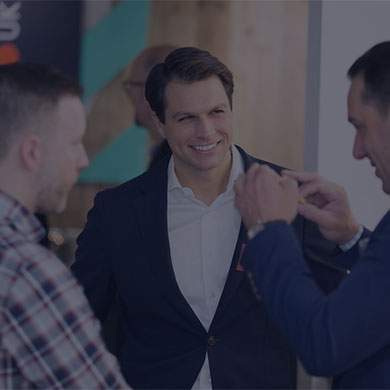 three men talking joyfully about consultation responses