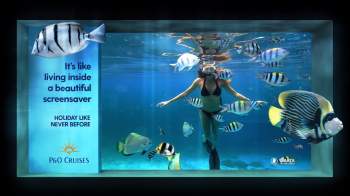 woman swimming in a fish tank