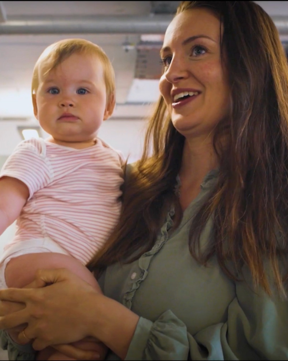 Website manager Yasmin and her baby Isa